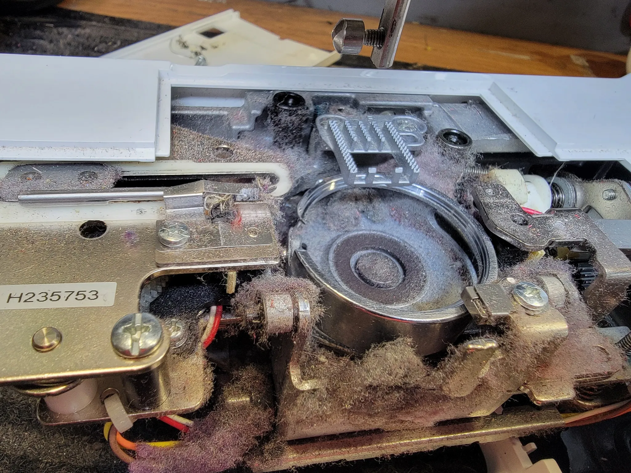 Modern machine interior with heavy lint and grease buildup